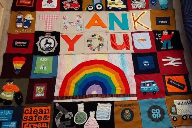 The group created a display banner to go outside Needlecraft to thank keyworkers, with members each decorating a square