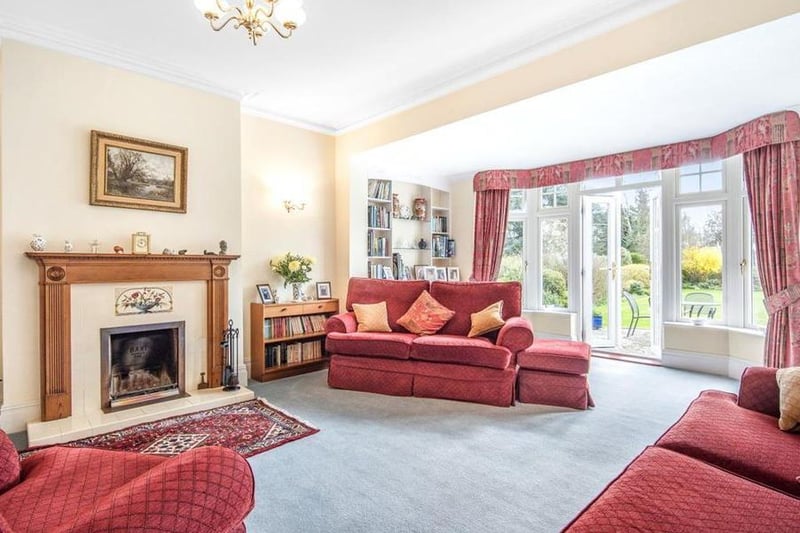 The sitting room is situated to the rear of the property with views over the garden