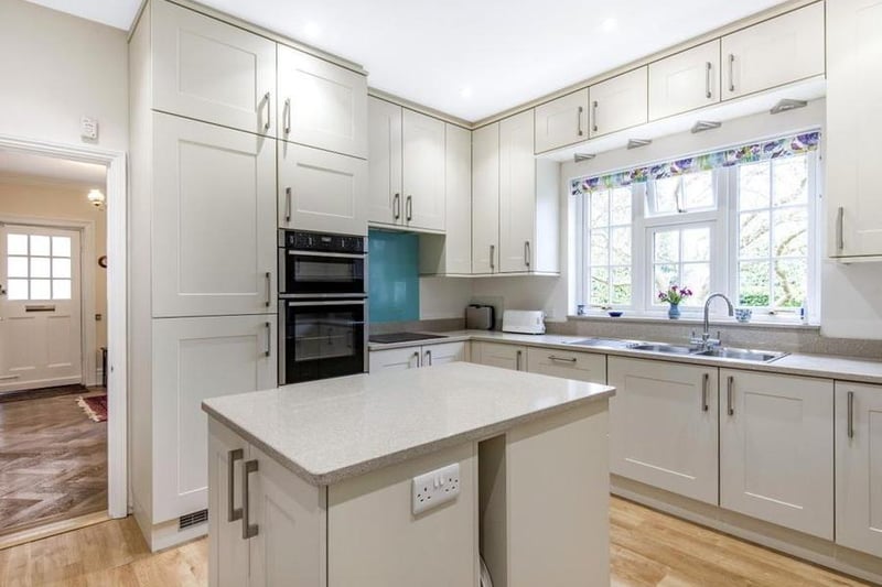 The kitchen has been recently replaced with modern gloss fronted units, granite work tops and fully integrated appliances