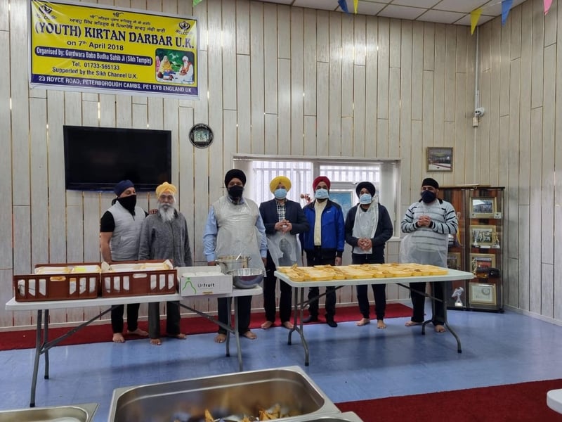 Sikhs prepare and deliver meals in Peterborough.