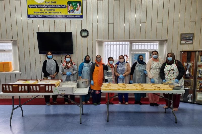 Sikhs prepare and deliver meals in Peterborough.