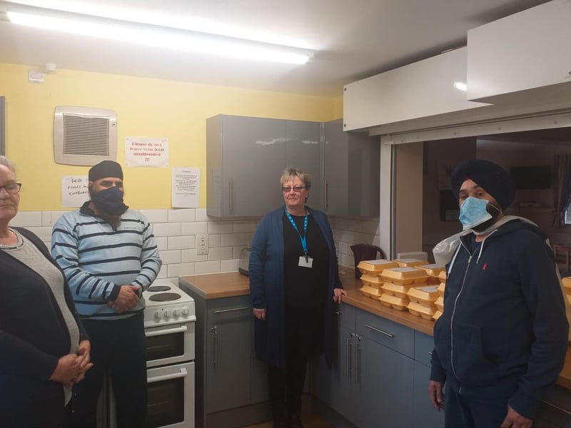 Sikhs prepare and deliver meals in Peterborough.