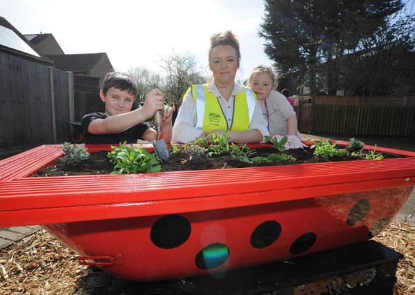 Residents Michelle Jarrett with Oli Chappell and Amelia McGinty.