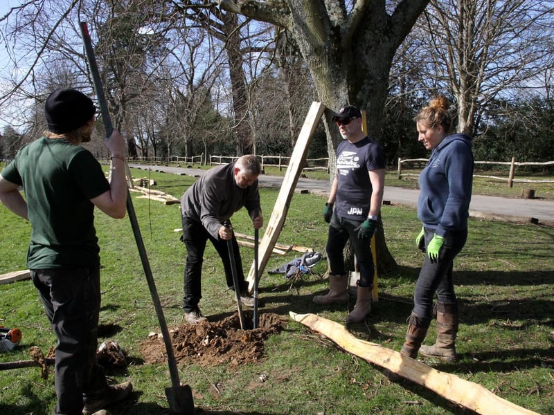 Repairing the boundary fence at Buxted Park Cricket Club ahead of play restarting / Picture: Ron Hill