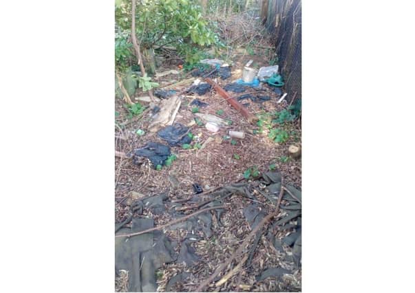 Rubbish fly-tipped in Muskham woods.