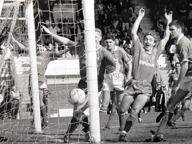 May 1991, Division Four. Chesterfield 2, Posh 2. Posh came from 2-0 down to secure the point that got them up from Division Four under Chris Turner on the final day of the season. The equalising goal that sent Posh up is pictured here.