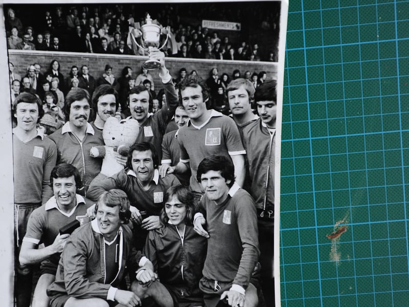 May, 197, Division Four. Posh 4, Gillingham 2. The Fourth Division title decider was a superb game in front of over 17,000 fans at London Road. Posh fell behind early, but won 4-2 thanks to two goals from top scorer and skipper John Cozens, a Jeff Lee penalty and a Chris Turner goal. Posh finished three points clear of runners-up Gillingham. Cozens is pictured with the Fourth Division trophy and his teammates.