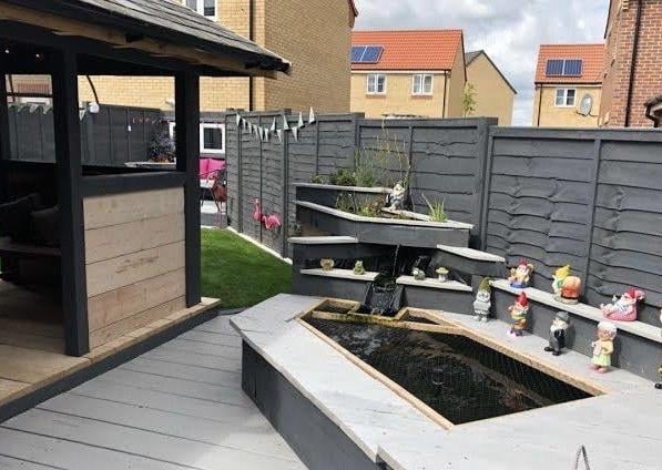 A stunning new water feature in the transformed garden.