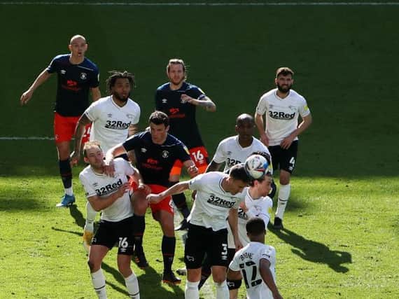 Action from the Hatters defeat to Derby County on Good Friday