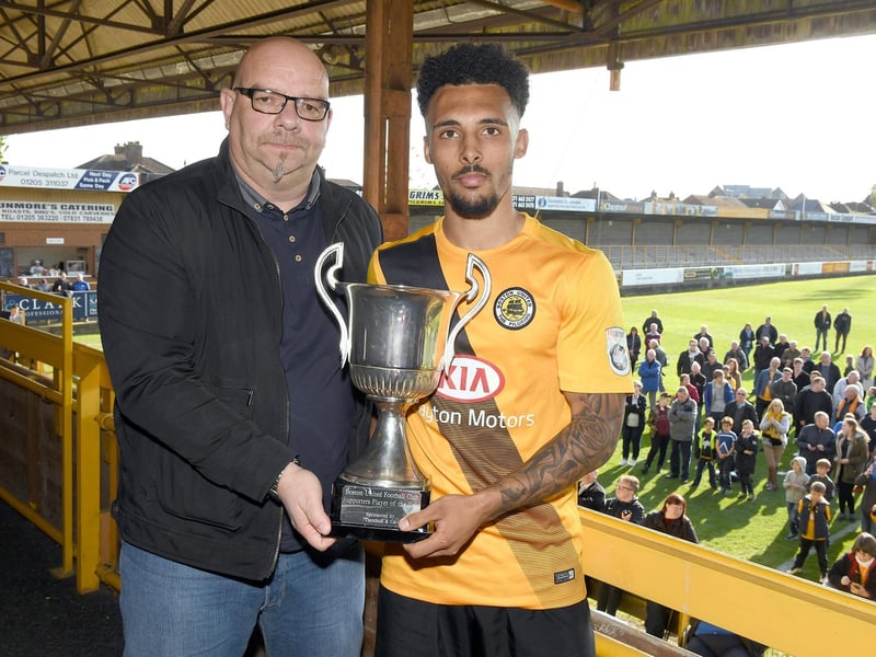 Collecting his Player of the Year award.