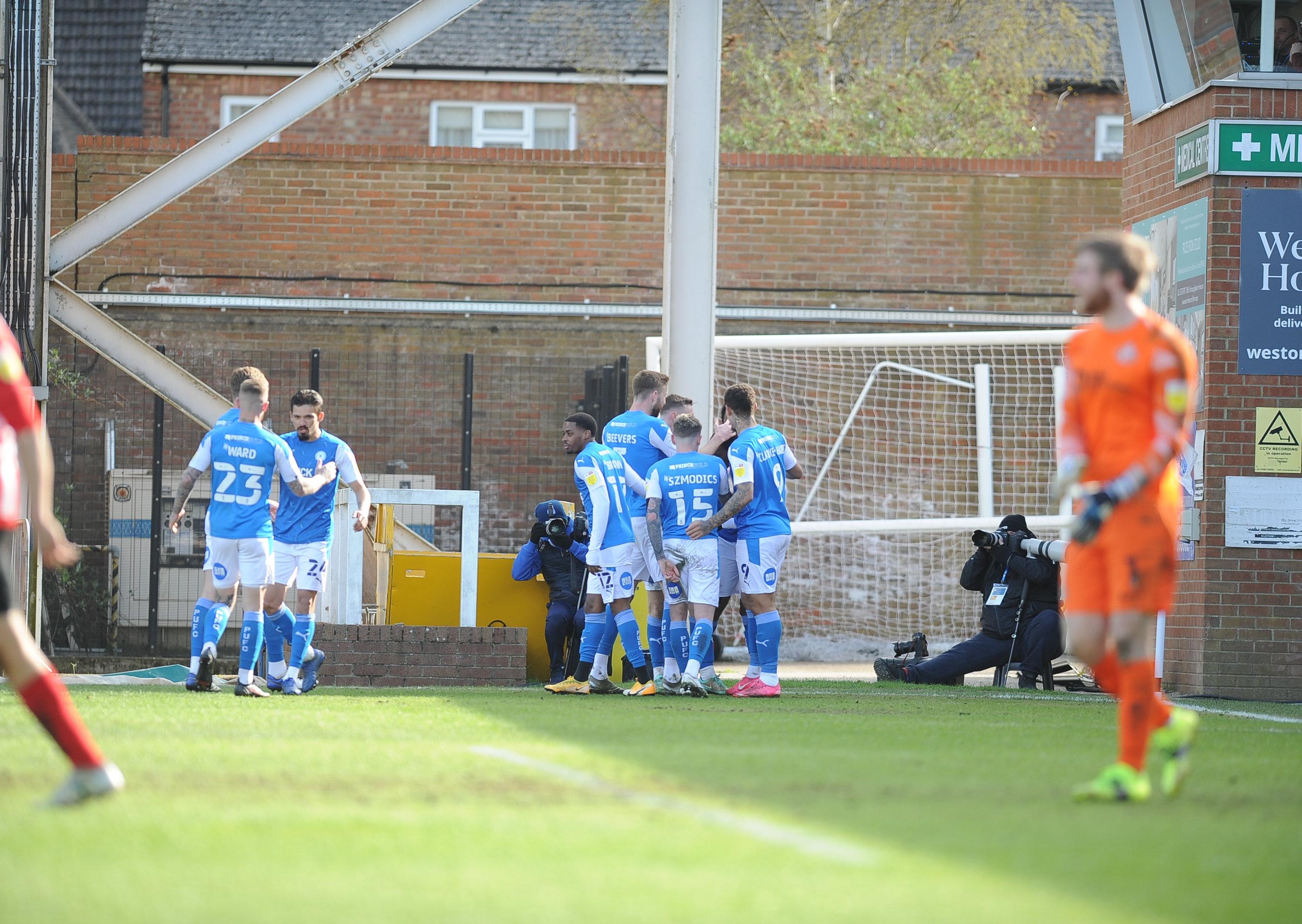 Posh players celebrate their goal against Sunderland. Photo: David Lowndes.