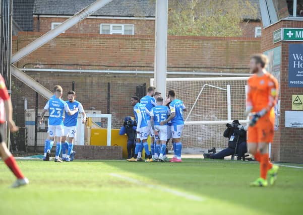 Posh players celebrate their goal against Sunderland. Photo: David Lowndes.