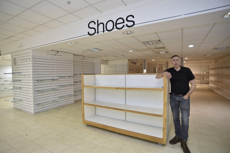 Beales chief executive Tony Brown in the shoes department. EMN-210104-165612009