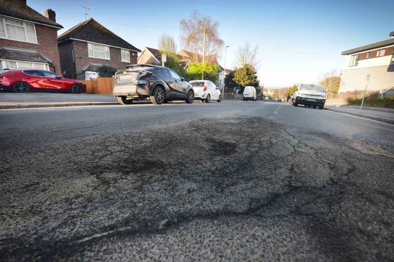 Huge pothole in Buckhurst Road, Bexhill. SUS-210704-091222001