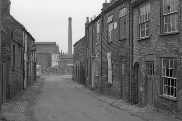 Some houses in King Street were still occupied, others were empty with windows smashed and doors broken. (Readers have identified this as Pinfold Lane, though).