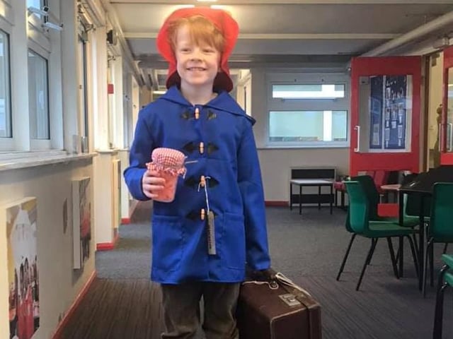 Here's Finn as Paddington - carrying a vintage suitcase!