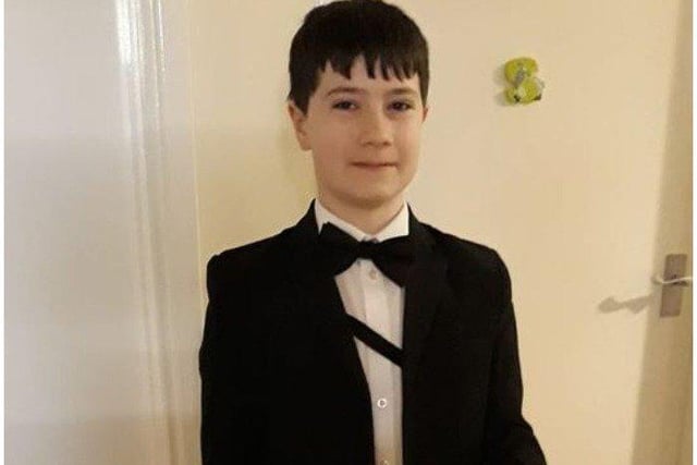 Senen Lamb, 11, as super spy James Bond.
Senen attends Little Common School