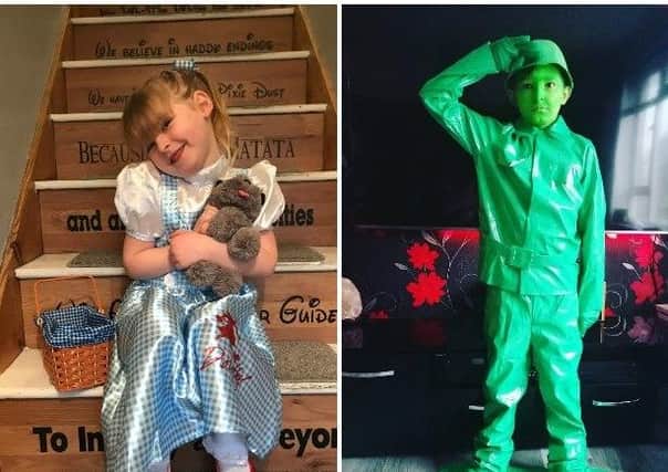 Evie Haines, 4 as Dorothy  and Spencer Wykes, 10,  as a toy solider. Both from White Meadows Primary Academy
