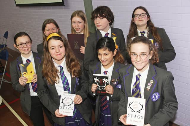 Worthing High School with books by M. A. Bennett on World Book Day. Photo by Derek Martin DM2030150a