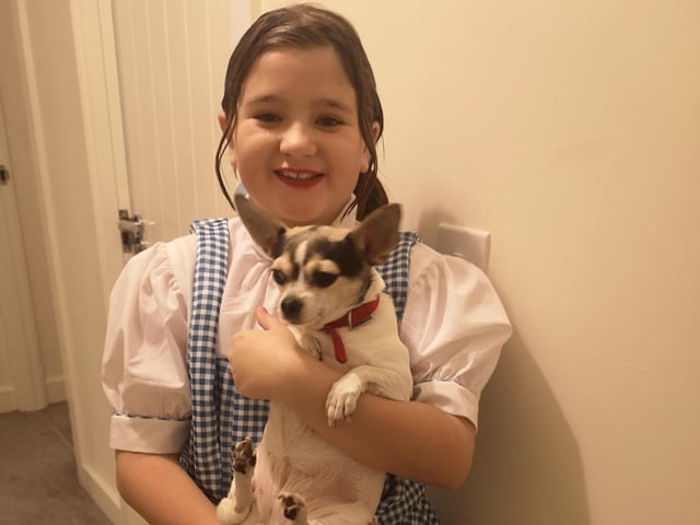 Jo Blakesley's daughter Lexi as Dorothy from the Wizard of Oz with her dog Bessie as Toto