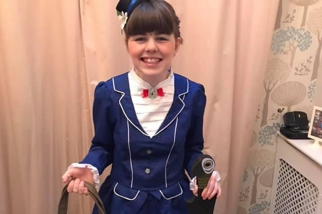 Grace Hollowell, 17, on her way to Billingbrook Special Needs School in Northampton as Mary Poppins for her last World Book Day