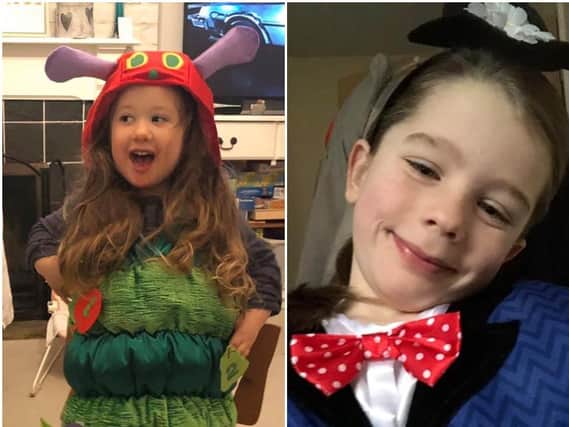 Remie Richardson, 3 went off to St Pauls Pre-School yesterday dressed as the Hungry Caterpillar, and Catherine Wells, 7, took this selfie dressed as Mary Poppins before she went to St Joseph's Primary School in Haywards Heath