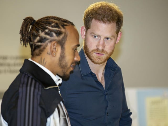 Prince Harry and Lewis Hamilton are shown around The Silverstone Experience