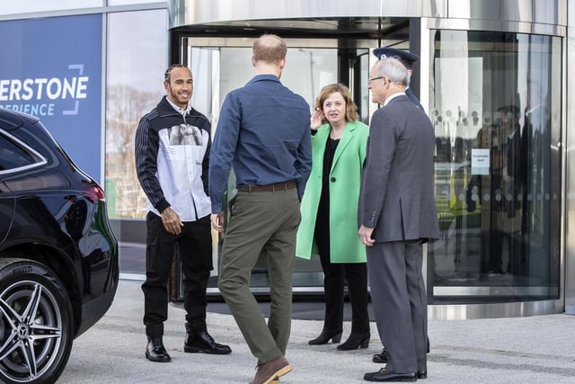 Prince Harry and Lewis Hamilton are welcomed to The Silverstone Experience by chief executive Sally Reynolds