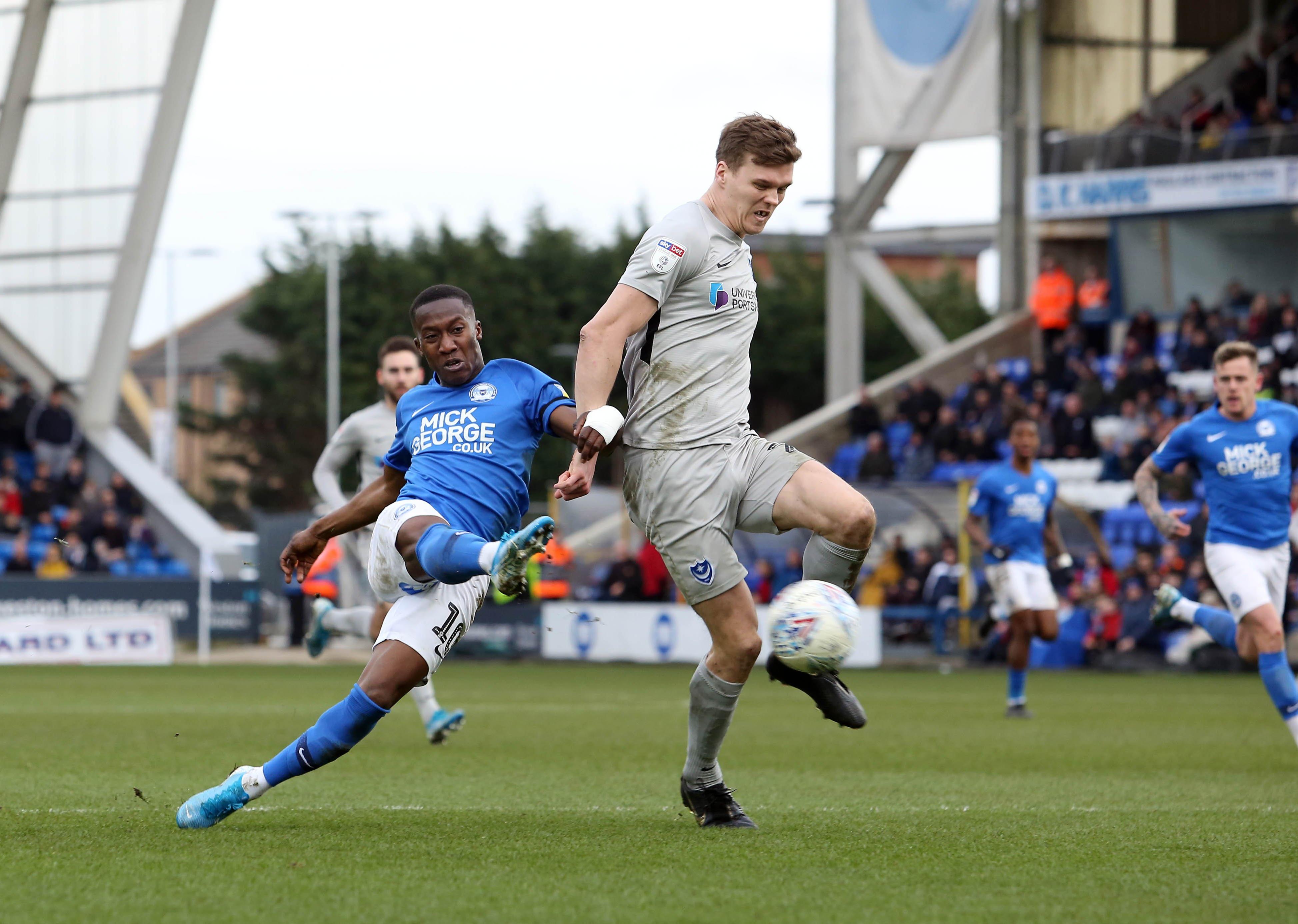 Siriki Dembele of Peterborough United in action with Sean Raggett of Portsmouth - Mandatory by-line: Joe Dent/JMP - 07/03/2020 - FOOTBALL - Weston Homes Stadium - Peterborough, England - Peterborough United v Portsmouth - Sky Bet League One