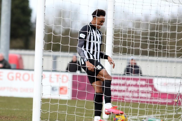 Northampton Town loanee Caleb Chukwuemeka walks the ball into the net for his goal