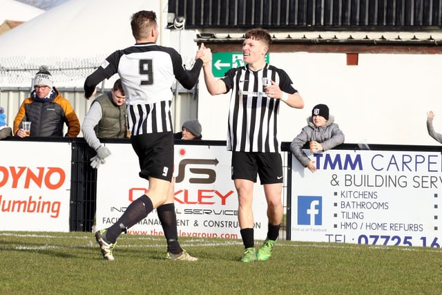 Jordon Crawford is congratulated by Elliot Sandy after his goal