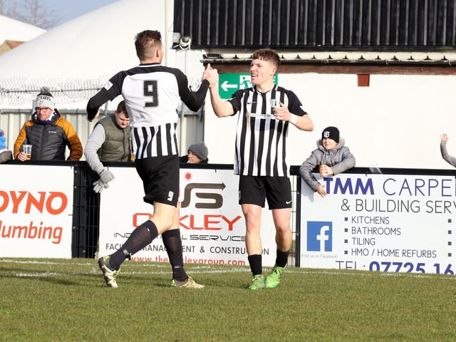 Jordon Crawford is congratulated by Elliot Sandy after his goal