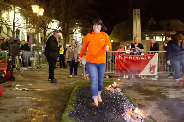St Catherine's Hopsice held its firewalk fundraiser in the Carfax. Picture:  Steve James - www.shooterz.co.uk SUS-200316-155841001