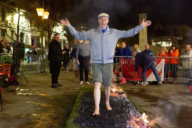 St Catherine's Hopsice held its firewalk fundraiser in the Carfax. Picture:  Steve James - www.shooterz.co.uk SUS-200316-155854001