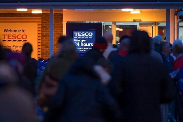 Shoppers queue to get in to Aylesbury Broadfields Tesco