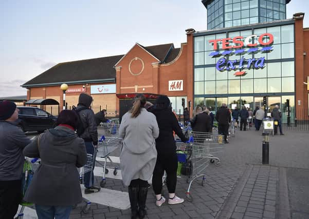 Tesco at Serpentine Green shoppers queuing at 5.50am on Saturday morning EMN-200321-100550009