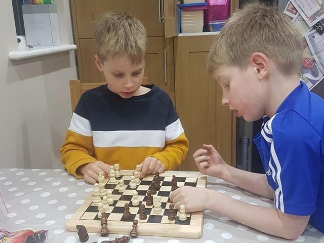 Chess-filled days for Katheryn Adams' boys SUS-200322-143250001