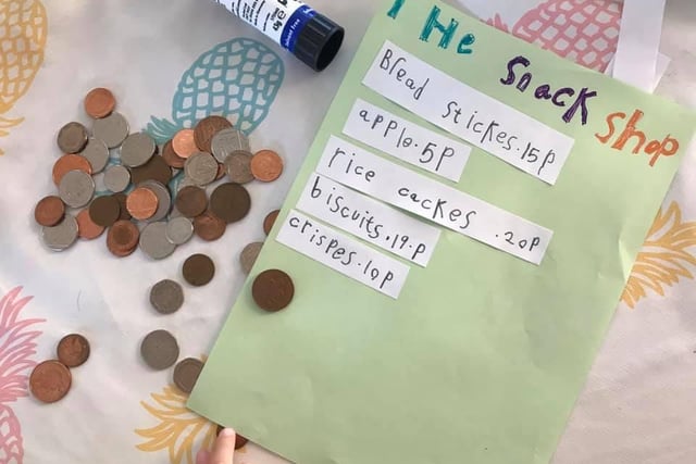Regan Rissick made a snack shop price list to practice adding and subtracting with real money