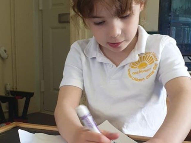 Alivia, age 4, spent the day drawing, practicing her writing and working out with Joe Wicks!
