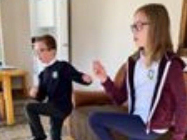 Lauren,9, and Thomas, 6, get some excercise with Joe Wicks photo courtsey of Carrie Blunden