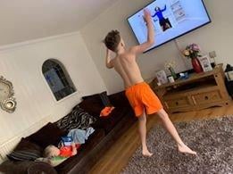 Jayden, 10, and Tommie, 3, get their morning excercise in with bodycoach Joe Wicfks VYGy_T_ICd2xHj3SjDhX