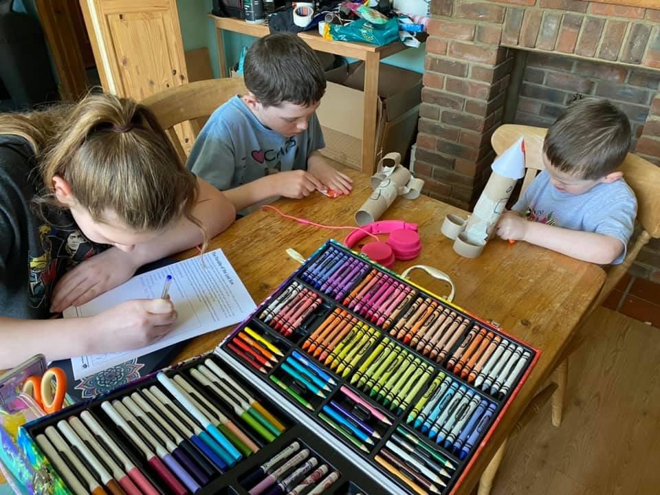 Evie, 13, Harrison, 10 and Jack, 4,getting creative after a morning of English and Maths m3Tx_q1fraWQCaeKyL_z