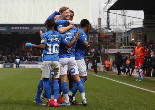 Posh players celebrate a goal at home to Rotherham in January.