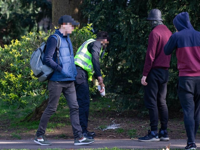 Beer being tipped away at Central Park. Photo: Terry Harris