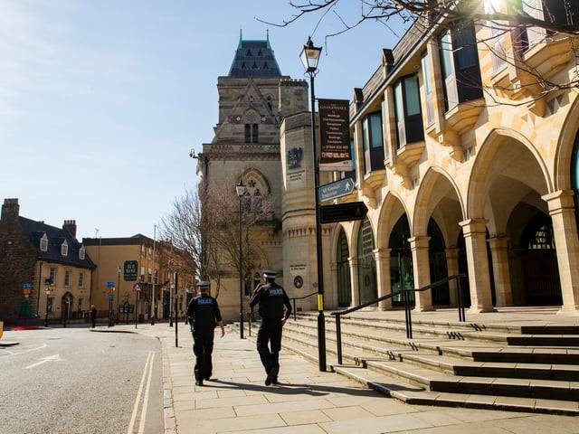 Only police officers in sight at the usually busy Guildhall. Photo: Leila Coker
