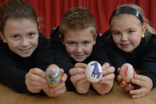 Egg rolling at East Worthing Community Centre, Emma Boniface with Kian and Sian Wood. Picture: Malcolm McCluskey W14136H10