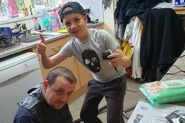Tara Edwards submitted this photo of her husband and son doing each
other's lockdown hair