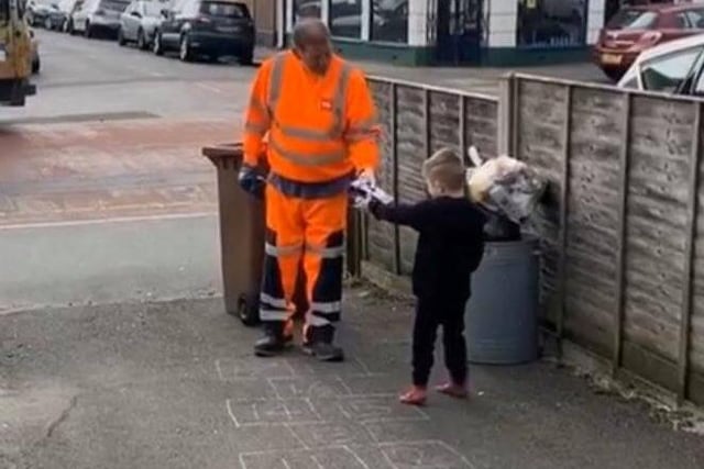 Five-year-old Buddy Strudwick thanking a hard-working dustman in Bognor by giving him an Easter egg. https://www.chichester.co.uk/health/coronavirus/clap-carers-watch-residents-chichester-bognor-regis-midhurst-and-petworth-applaud-nhs-staff-and-key-workers-2528907
