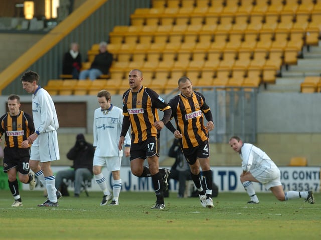 Question 4) Posh have only played in front of one attendance below 1,000 in a Football League match. At which ground? Pictured is a ground used to hosting small crowds.