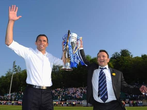 Gus Poyet and Brighton chairman Tony Bloom in 2011.